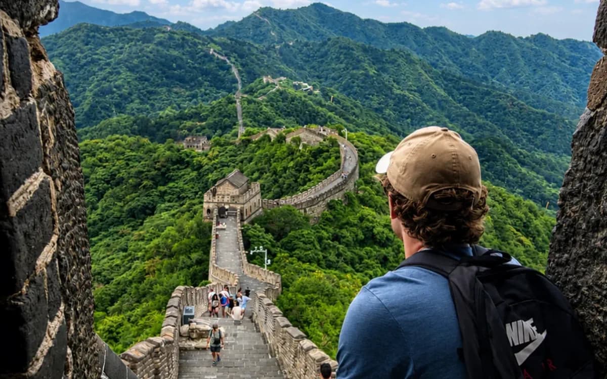 Stone steps climbing toward a Great Wall watchtower near Beijing