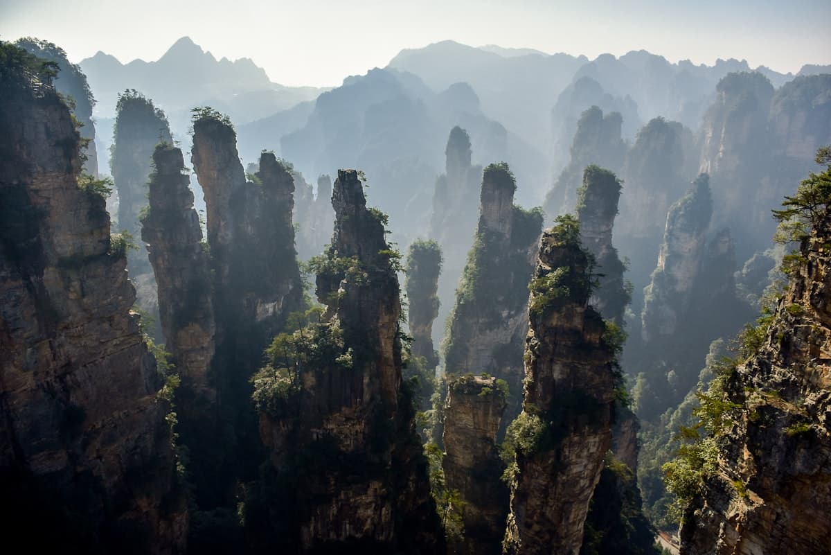 Sandstone columns rising above a sea of clouds in Zhangjiajie