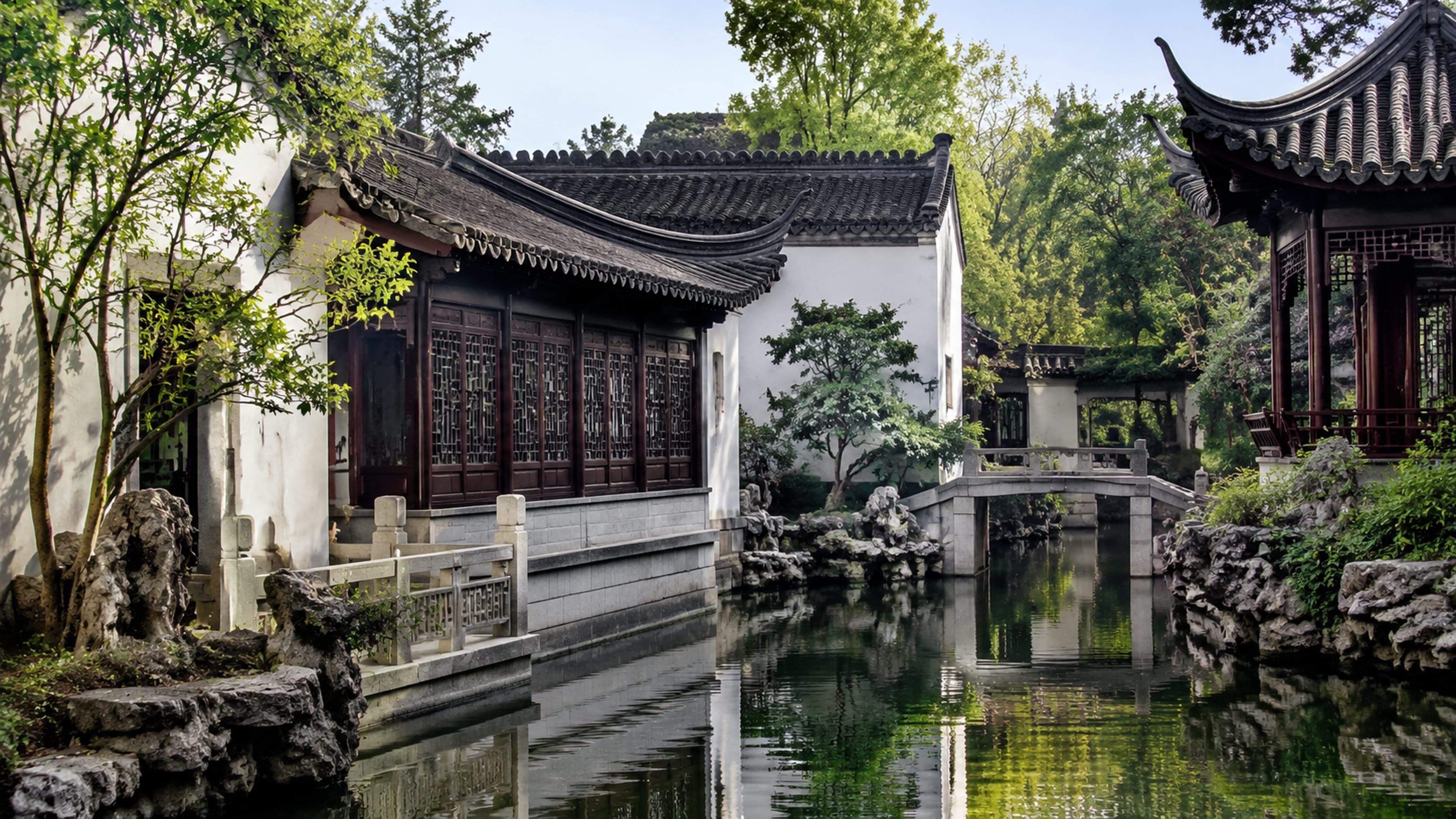 Classical Suzhou garden, water lanes, and white-walled Jiangnan courtyards