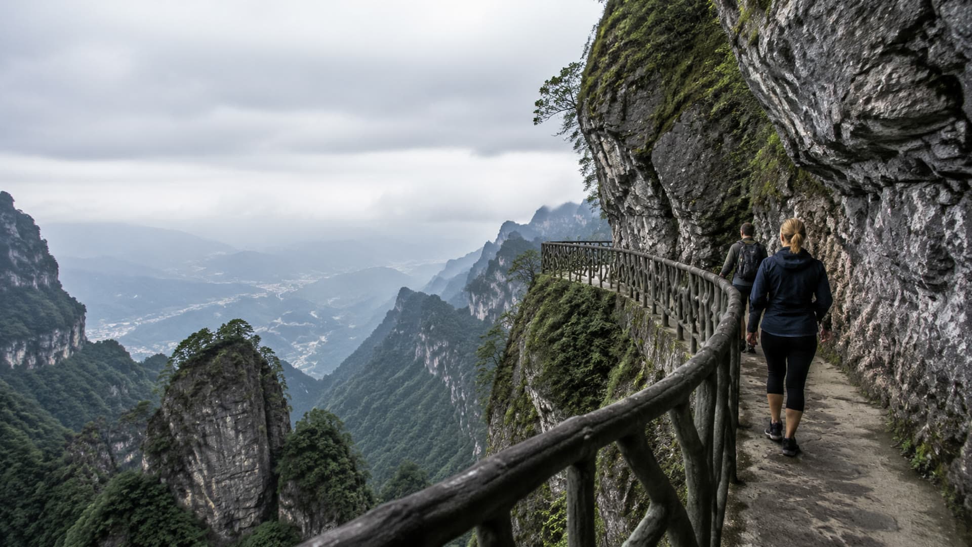 Zhangjiajie cliff path with distant mountain views