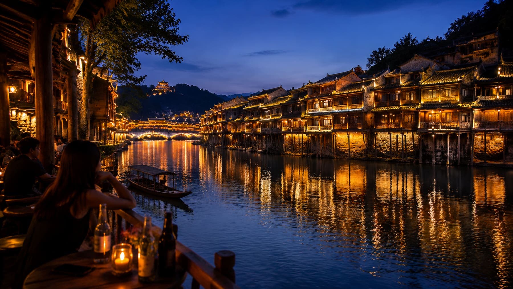 Fenghuang Ancient Town night lights reflected on the river