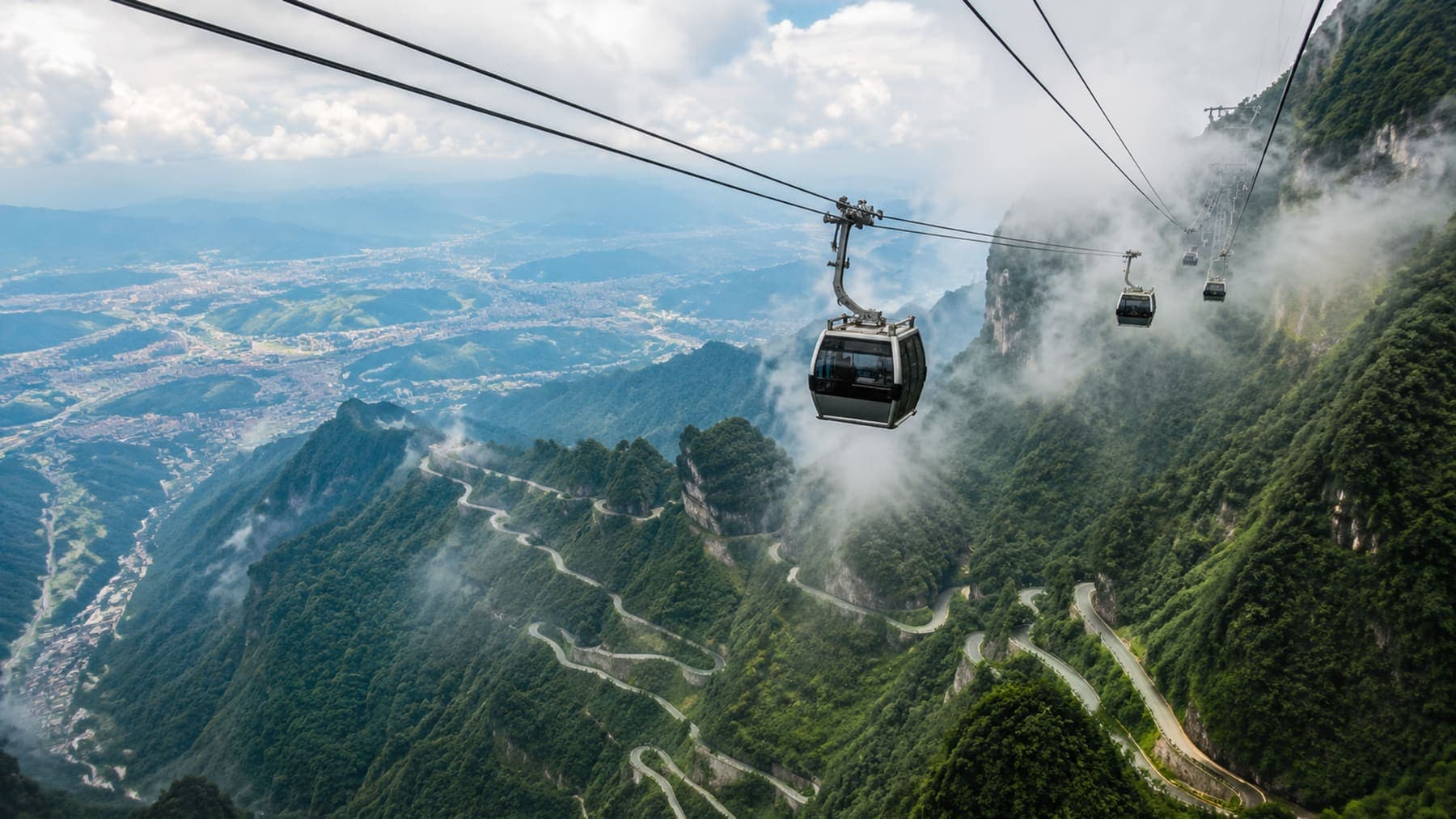 Tianmen Mountain cableway above the 99 Bends road